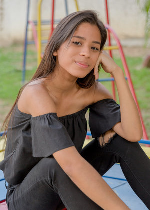 Middle-aged woman Danielle Brooks seduces a younger man in a black miniskirt